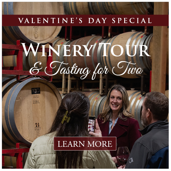 Photo of couple on a winery tour in the barrel room with text: Valentine's Day Special Winery Tour and Tasting for Two